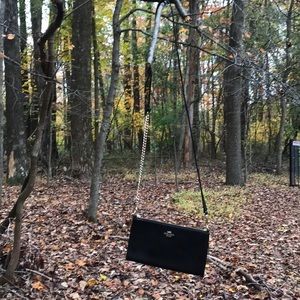 I am selling a black Coach cross body bag